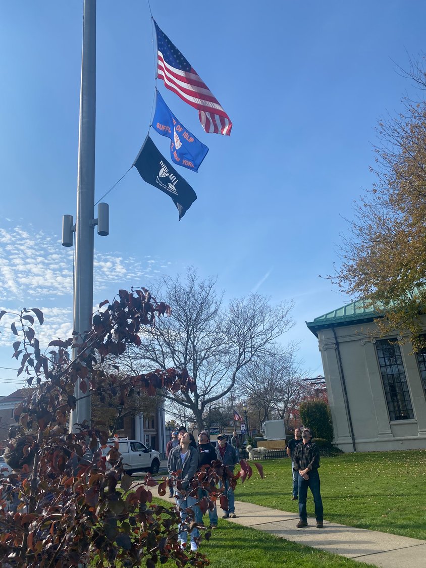 The flag was lowered and then raised again at 11 a.m. in accordance with the tradition of honoring “the eleventh hour of the eleventh day of the eleventh month,” which dates back to 1918 and the end of WWI.